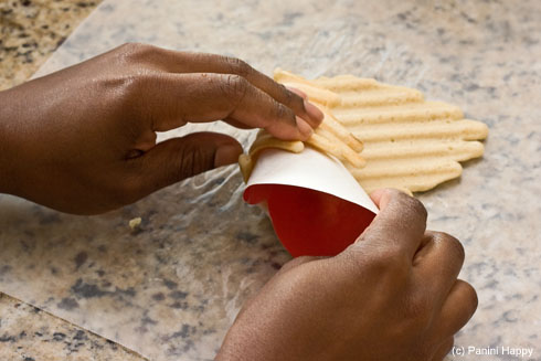 Roll the cookie around the mold