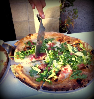 Prosciutto and arugula pizza from Isola Pizza Bar