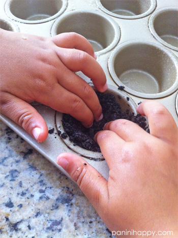 Pressing the crust into the pan