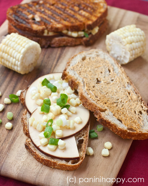 Sweet Corn Panini with Smoked Gouda, Scallions, and Chile Butter (c) Kathy Strahs